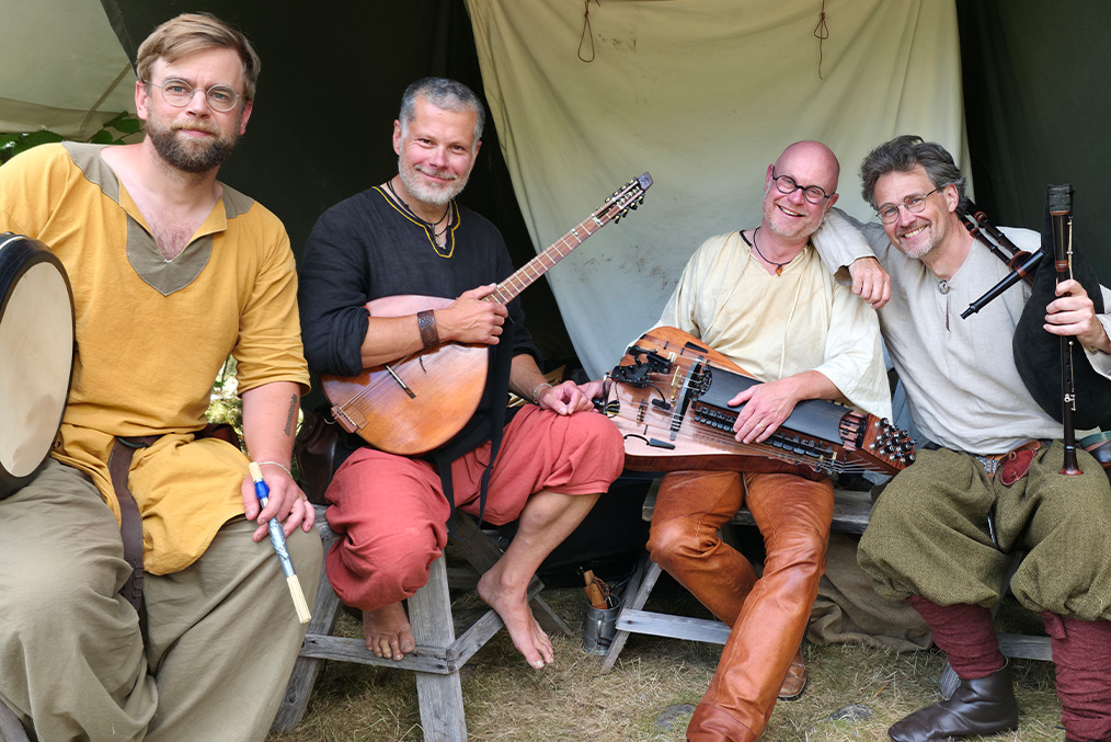 Dråm performing as a quartet in Viking clothes